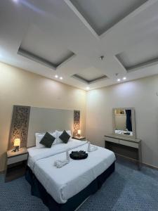 Ένα ή περισσότερα κρεβάτια σε δωμάτιο στο Quel Serviced Units