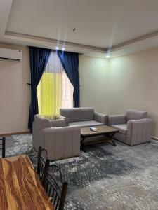 Χώρος καθιστικού στο Quel Serviced Units