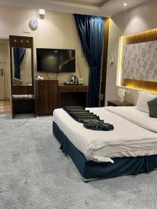 Μια τηλεόραση ή/και κέντρο ψυχαγωγίας στο Quel Serviced Units