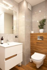 Ένα μπάνιο στο Luxus Apartament Zacumowani +20 φωτογραφίες