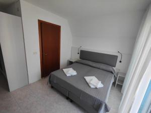 Postel nebo postele na pokoji v ubytování Hotel DOLCEVITA Park & Beach included