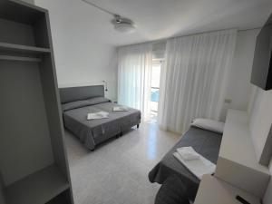 Postel nebo postele na pokoji v ubytování Hotel DOLCEVITA Park & Beach included + 37 fotografií