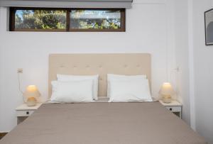 Posteľ alebo postele v izbe v ubytovaní Ferma Solaris Apartments