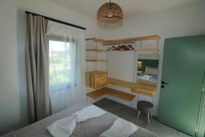 A bed or beds in a room at Paradise Garden Apartments Még 37 kép
