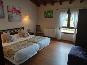 Postel nebo postele na pokoji v ubytování Hotel el Rincon de Yaxu