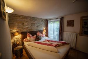Posteľ alebo postele v izbe v ubytovaní Ferienhaus Ötztal-Lodge