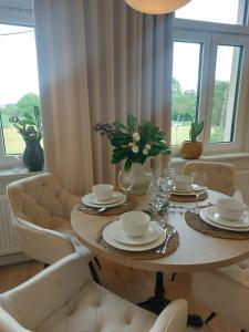 Posezení v ubytování Apartamenty Toszeckie LUX