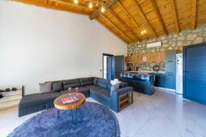 a living room with a couch and a table at VillaVista07 in Kaş
