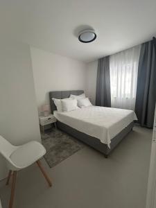 Postel nebo postele na pokoji v ubytování Vala