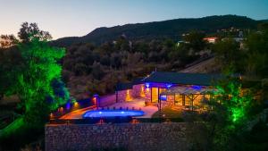 an aerial view of a house with a swimming pool at VillaVista07 in Kaş