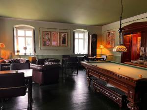 a living room with a pool table in it at CG Haensch in Großschönau