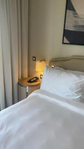 Marassi beachfront escape, Address beach resort客房内的一张或多张床位