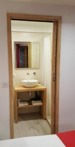 Koupelna v ubytování Hotel Du Clocher