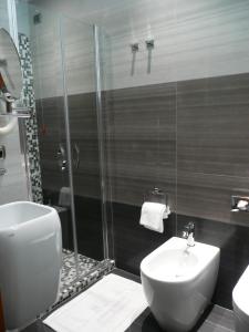 Koupelna v ubytování Hotel Tirrenia