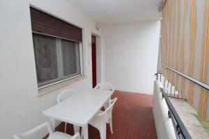Balkón alebo terasa v ubytovaní Apartment in Rosolina Mare 25073