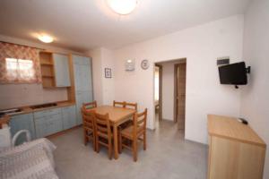 Kuchyňa alebo kuchynka v ubytovaní Apartment in Rosolina Mare 25073