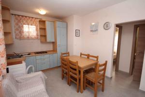 Kuchyňa alebo kuchynka v ubytovaní Apartment in Rosolina Mare 25073