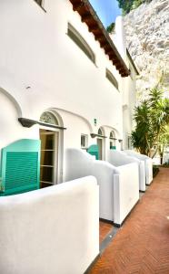 Posezení v ubytování Cala Prodani Rooms