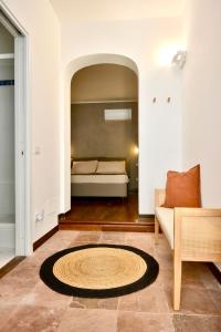 Posezení v ubytování Cala Prodani Rooms