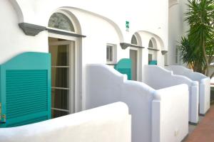 Posezení v ubytování Cala Prodani Rooms