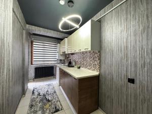 a kitchen with a sink and a counter top at Asrın GOLD in Eskisehir