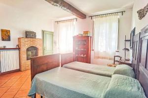 Postel nebo postele na pokoji v ubytování B&B Due Fiumi 1908