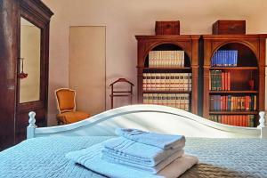 Postel nebo postele na pokoji v ubytování B&B Due Fiumi 1908
