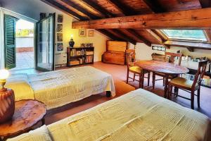 Postel nebo postele na pokoji v ubytování B&B Due Fiumi 1908
