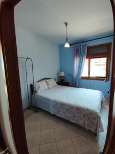 Giường trong phòng chung tại villa katerina