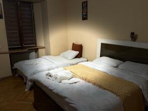 Postel nebo postele na pokoji v ubytování Hotel Kiwi Garden