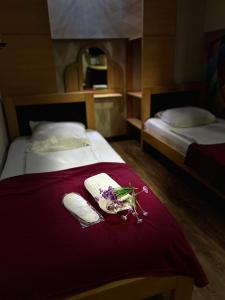 Postel nebo postele na pokoji v ubytování Hotel Kiwi Garden