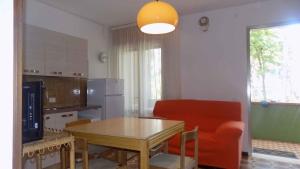 Kuchyň nebo kuchyňský kout v ubytování Apartment in Eraclea Mare 25654 + 11 fotografií