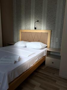Postel nebo postele na pokoji v ubytování Hotel Kiwi Garden