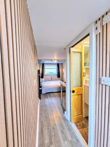 Ένα ή περισσότερα κρεβάτια σε δωμάτιο στο Rooms FG