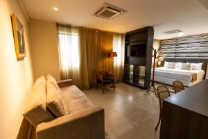 Postel nebo postele na pokoji v ubytování Mais Hotel Aeroporto Salvador