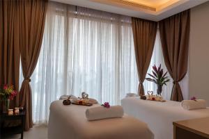 Postel nebo postele na pokoji v ubytování Radisson Blu Hotel, Conakry
