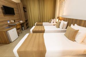TV a/nebo společenská místnost v ubytování Mais Hotel Aeroporto Salvador