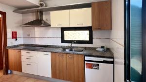 a kitchen with a sink and a counter top at Anahi Homes Corralejo- Bicacarera 7 in La Oliva