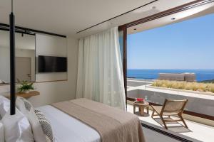 Postel nebo postele na pokoji v ubytování Seanatra Luxury Villas + 37 fotografií