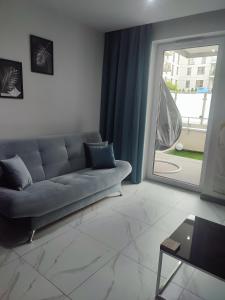 Posedenie v ubytovaní Apartament Przystań z tarasem