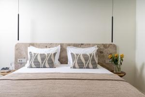 Postel nebo postele na pokoji v ubytování Seanatra Luxury Villas