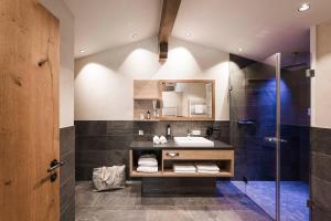 Koupelna v ubytování Das Kaltenbach - ApartHotel