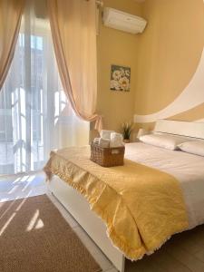 A bed or beds in a room at Terrazza Garibaldi