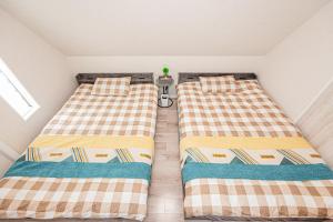 Postel nebo postele na pokoji v ubytování Private 3 Bedroom House with Free Parking Near Asakusa and Skytree