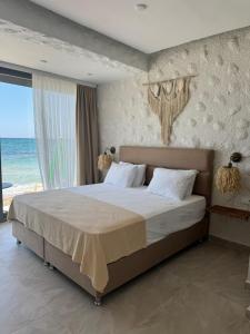 Ένα ή περισσότερα κρεβάτια σε δωμάτιο στο Aporte Hotel Cesme +44 φωτογραφίες