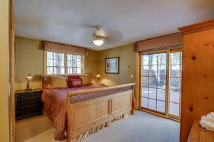 a bedroom with a bed and a window at 1 Pine Mountain in Sunriver +26 photos