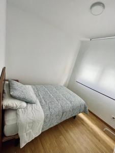 Postel nebo postele na pokoji v ubytování Apartamentos Alborada en Corcubión