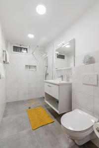 Ένα μπάνιο στο Apartments Wojcicky