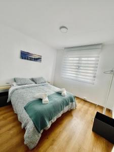 Postel nebo postele na pokoji v ubytování Apartamentos Alborada en Corcubión