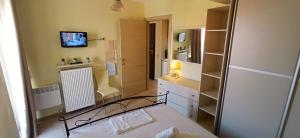 Postel nebo postele na pokoji v ubytování Katerina sitia apartments 1
